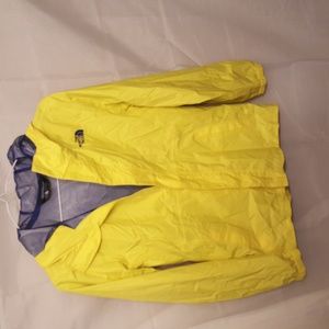 Womans North face yellow wind-breaker
